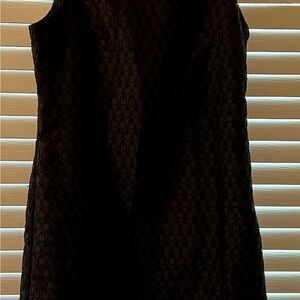 Boutique A line black dress with unique pattern. Side zipper.